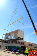 hospital buildings craned into position